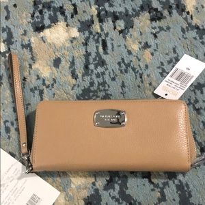 Brand new Michael Kors wallet with clutch strap